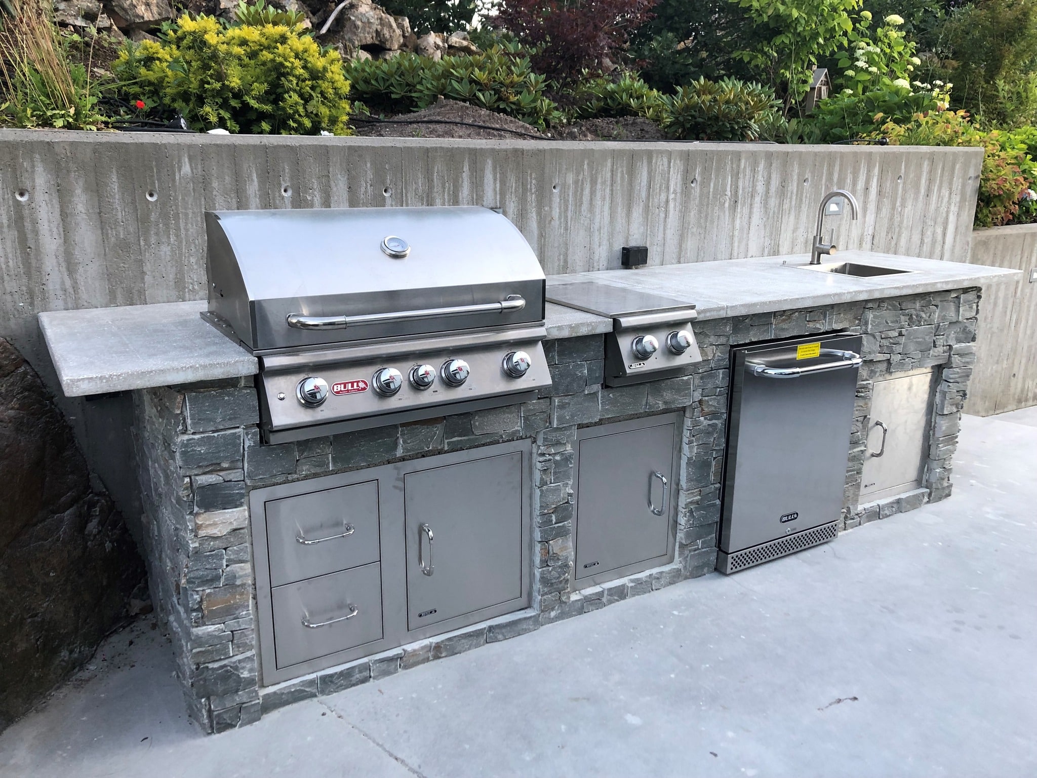 Outdoor bbq kitchen and stainless steel grill with fridge
